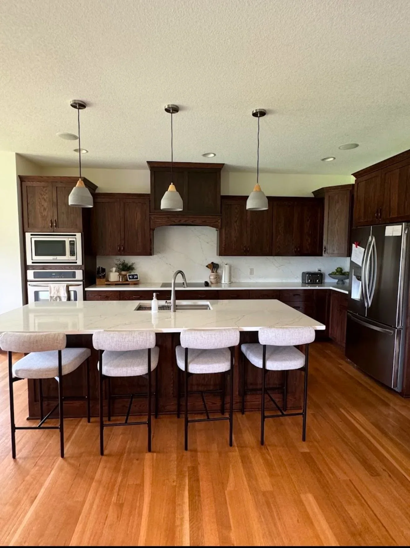 Completed kitchen with dark cabinets
